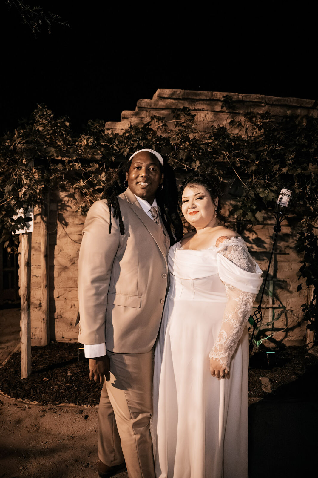 A couple portrait at night beneath the fig tree