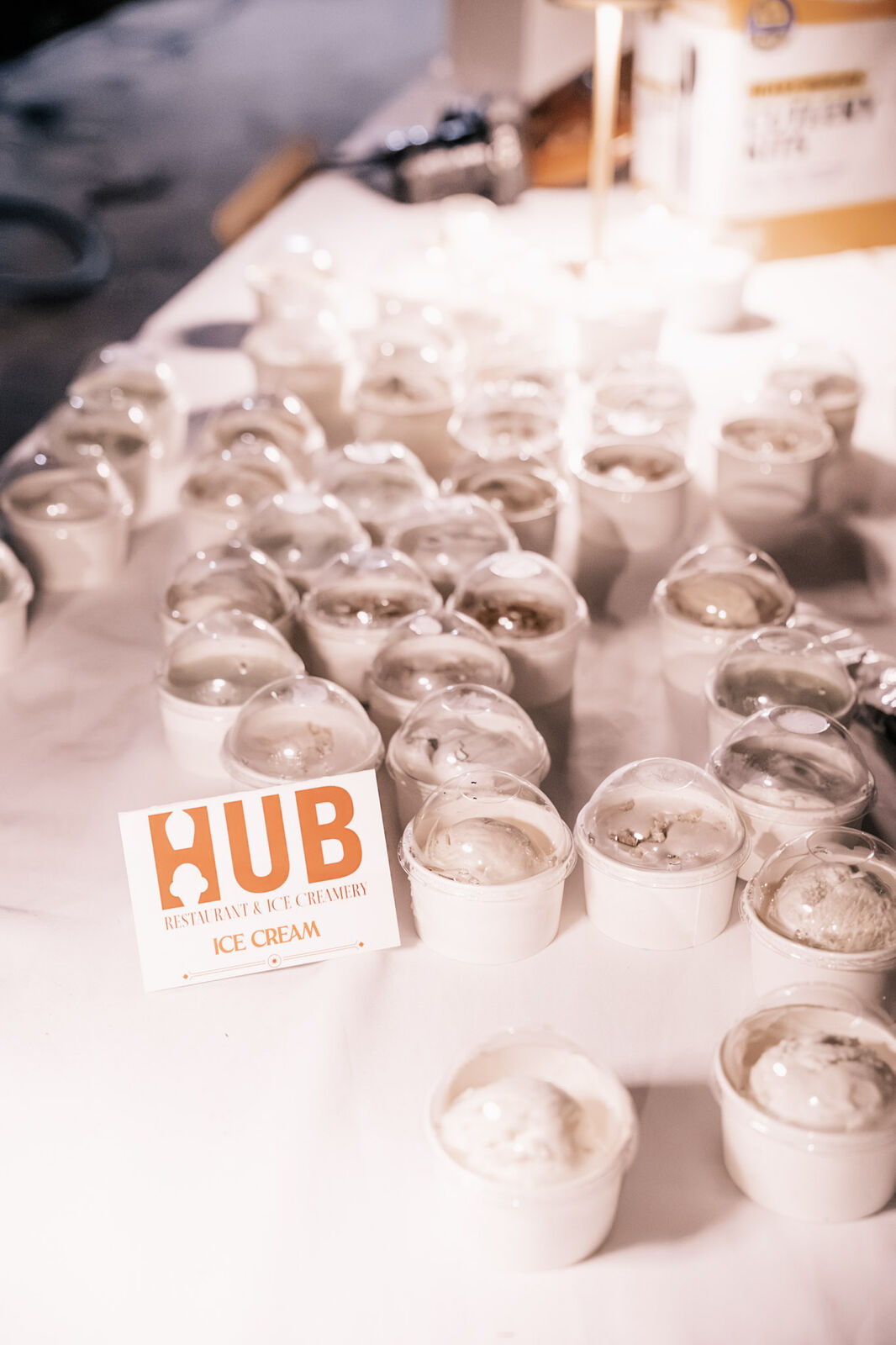 Rows of dessert cups set out for the guests