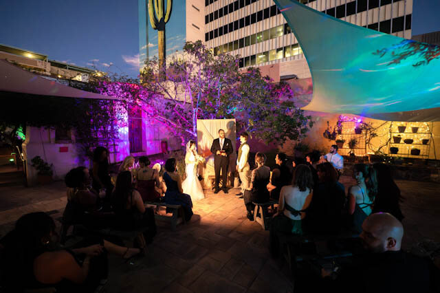 The courtyard after dark, lit for an evening ceremony